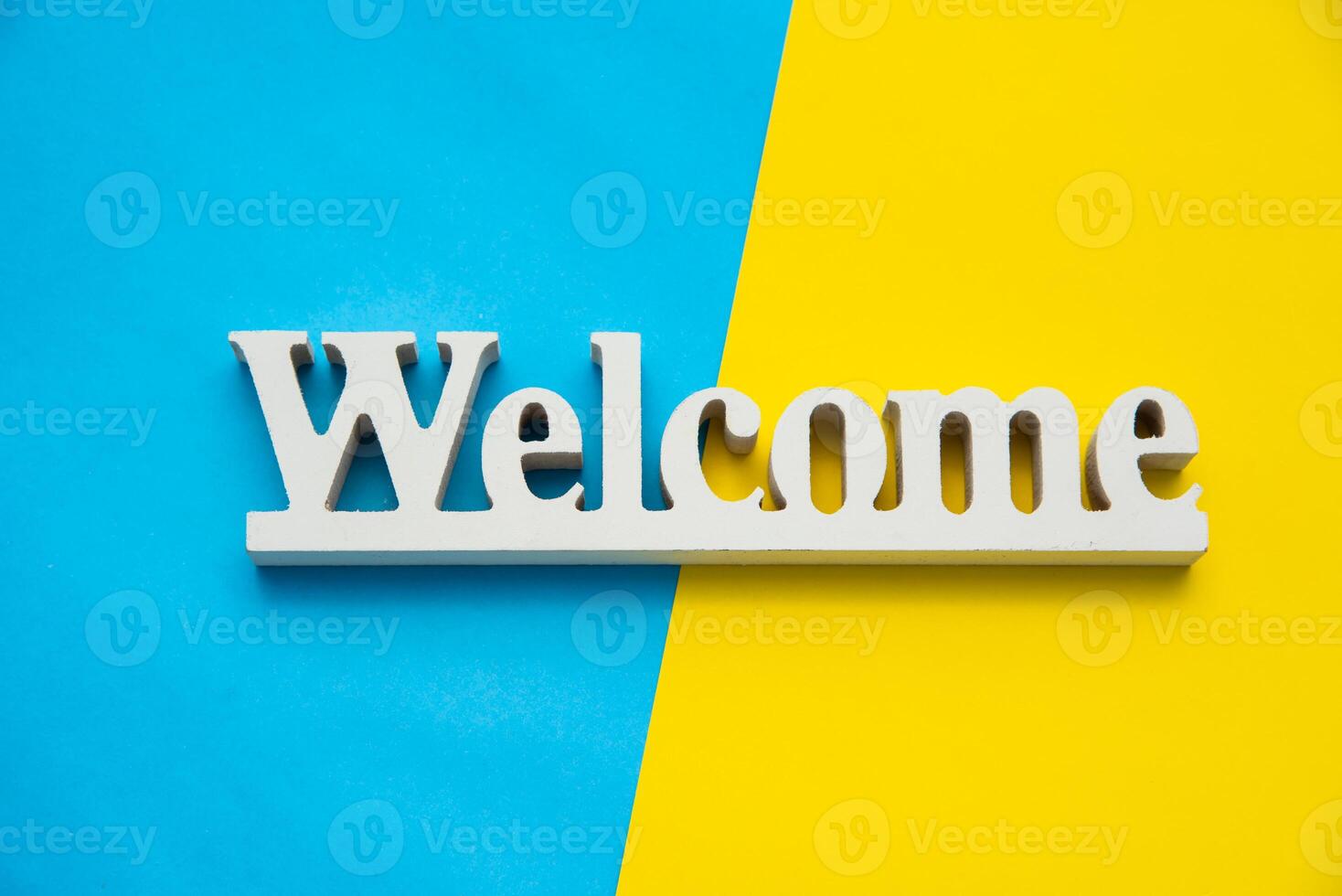 Top view for Welcome sign on a colorful background. photo