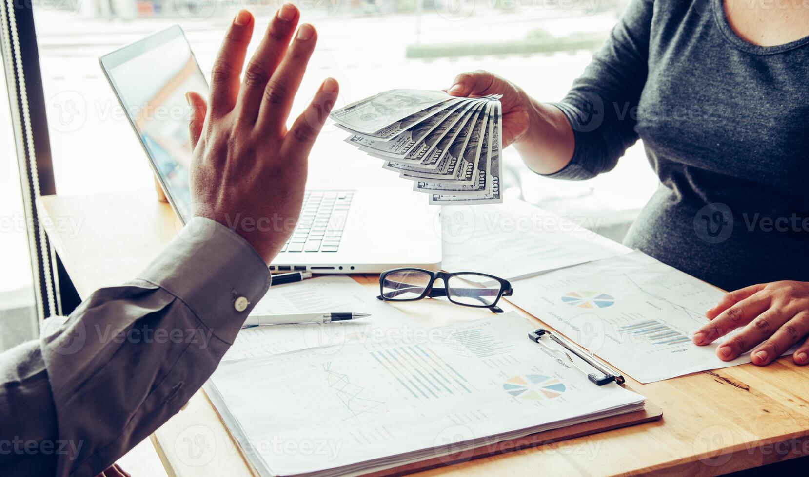 Businessman refusing money  the concept of corruption and anti bribery photo