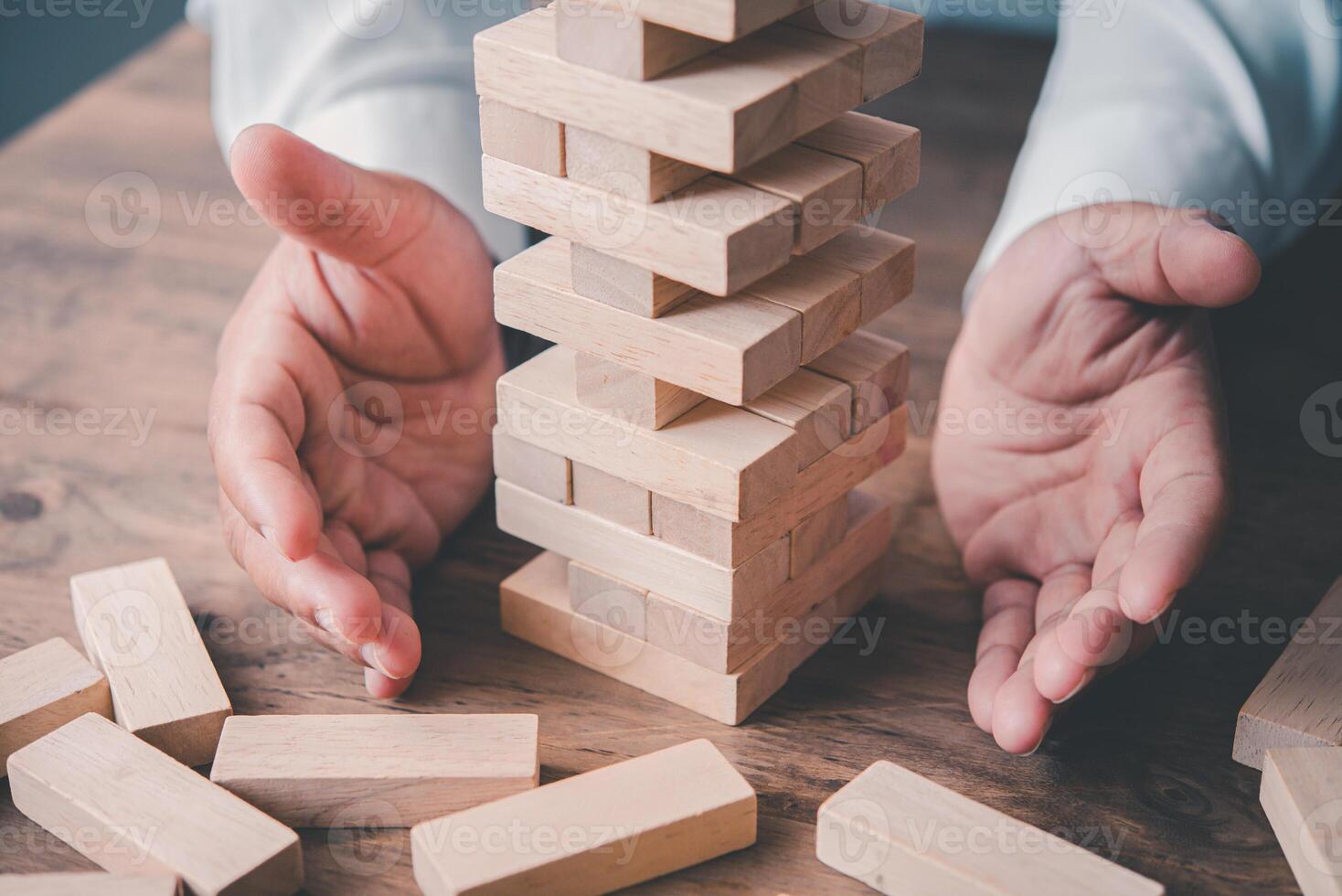 Business risks in the business. Requires planning Meditation must be careful in deciding to reduce the risk in the business. As the game drew to a wooden block from the tower photo