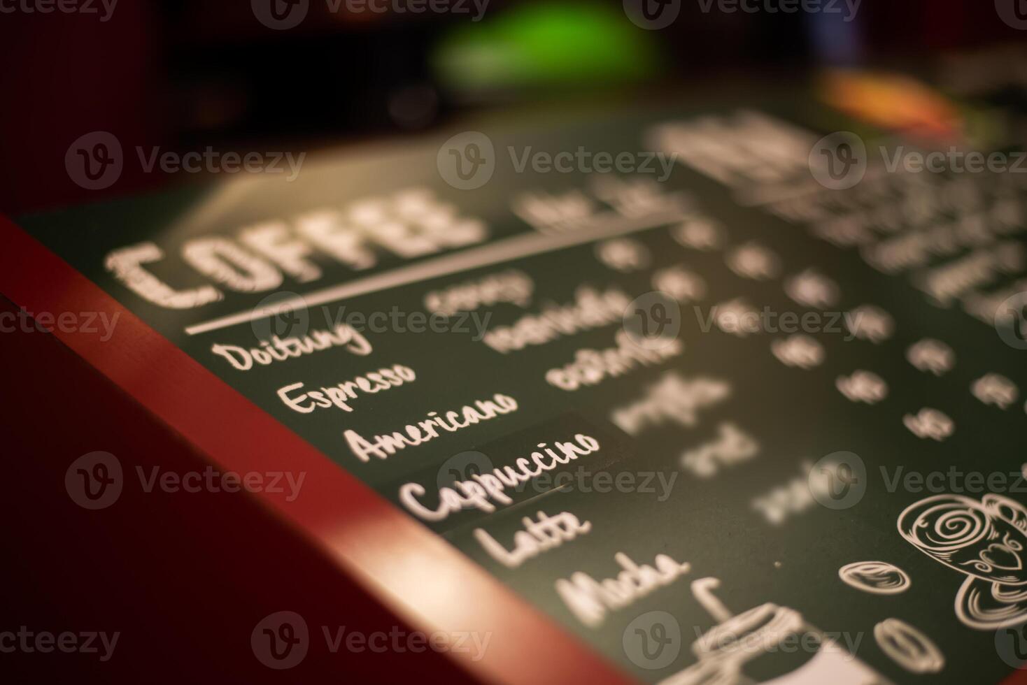 Coffee signs in the shop for customers to order. photo