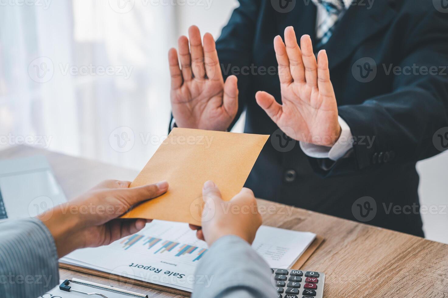 Dollar bills are not accepted as bribes by businesspeople. Concepts of anti-bribery and anti-corruption photo