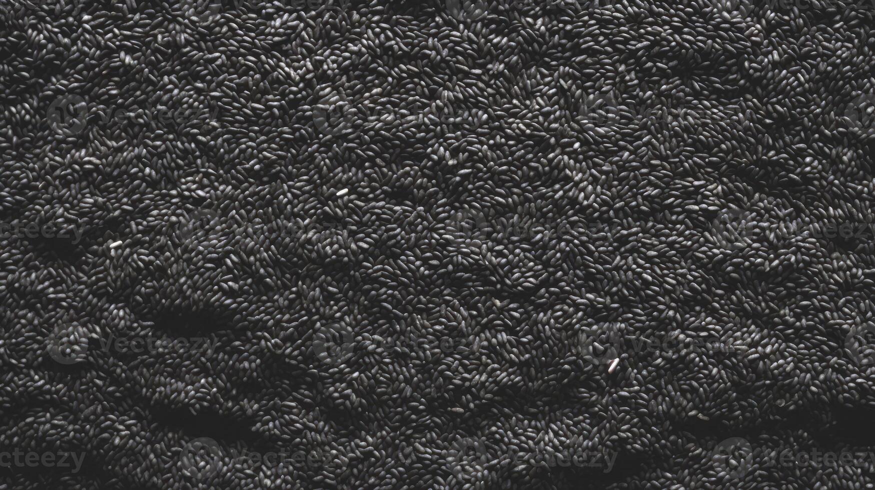 AI generated Top view of Black sesame seeds. Background texture of raw Black sesame seeds. Superfood. Copy space. Banner. Culinary and food concepts photo