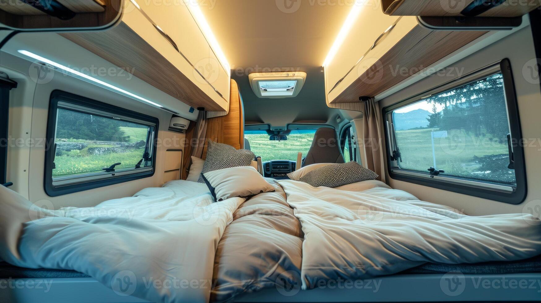 AI generated Modern camper van interior with a cozy interior and beautiful views of nature from the windows. Concept of mobile living, adventure travel, road trips, and nature-connected lifestyles photo