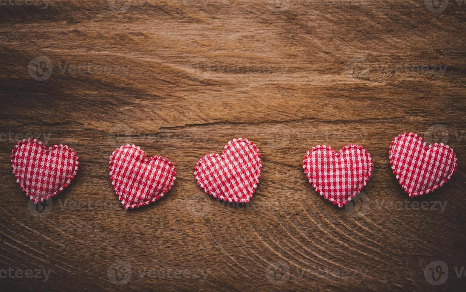 The heart lay on the wooden floor - Valentine Day concept. photo