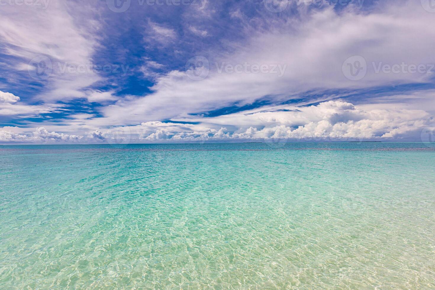 Crystal clear sea water bay. Pristine ocean lagoon sunny cloudy sky, idyllic relaxing seascape. Transparent surface, exotic travel. tropics Mediterranean nature panorama. Summer background, beach view photo