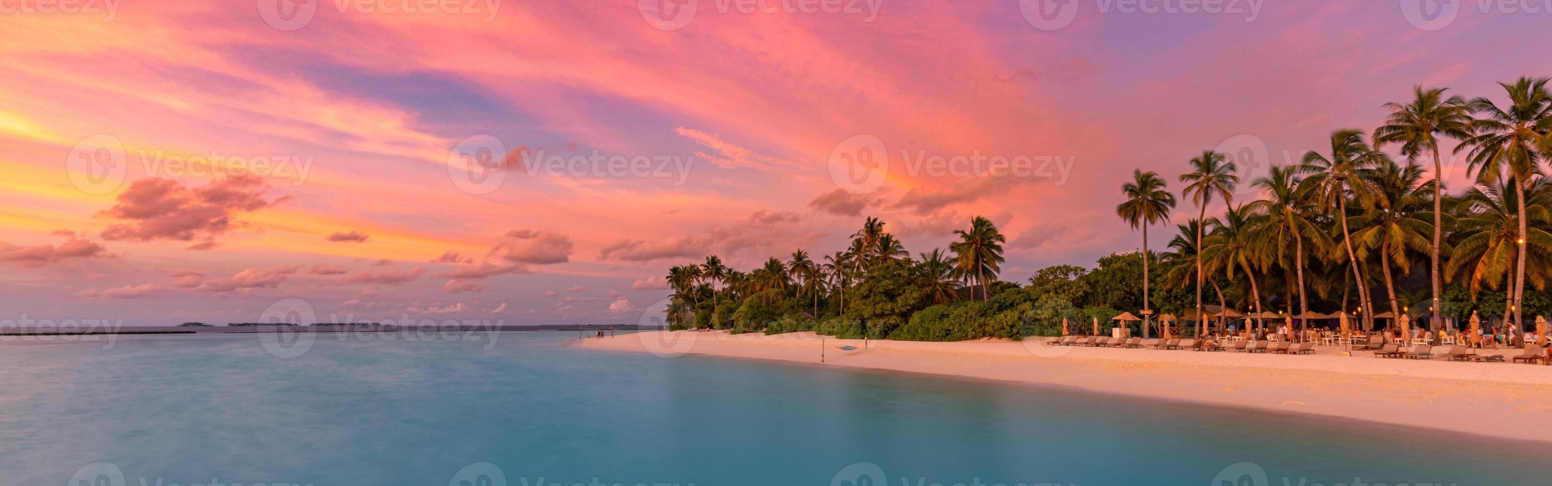 Aerial sunrise sunset bay view, colorful sky and clouds with amazing beach. Meditation relaxation tropical drone view sea ocean water. Aerial nature skyscape seascape background. Tropical beach view photo