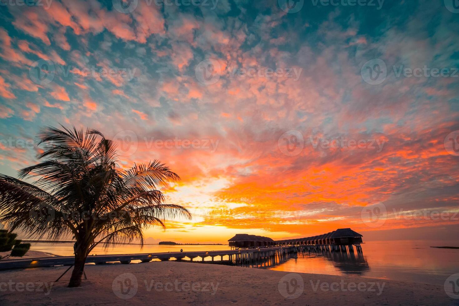Amazing panorama beach landscape. Maldives sunset seascape view. Horizon with sea and sky. Tranquil scenery, tourism and travel banner photo