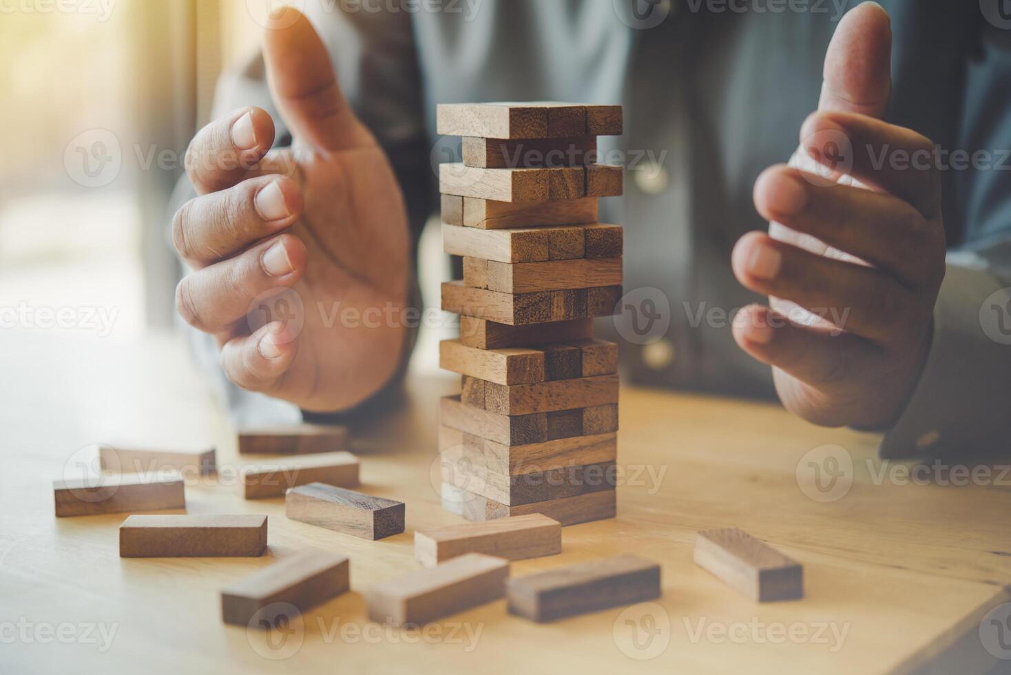 Business risks in the business. Requires planning Meditation must be careful in deciding to reduce the risk in the business. As the game drew to a wooden block from the tower photo