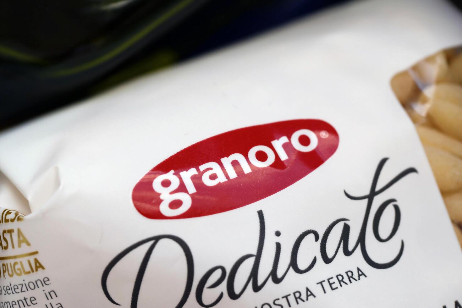 KYIV, UKRAINE - 4 MAY, 2023 Granoro logo on cardboard pack of italian food photo