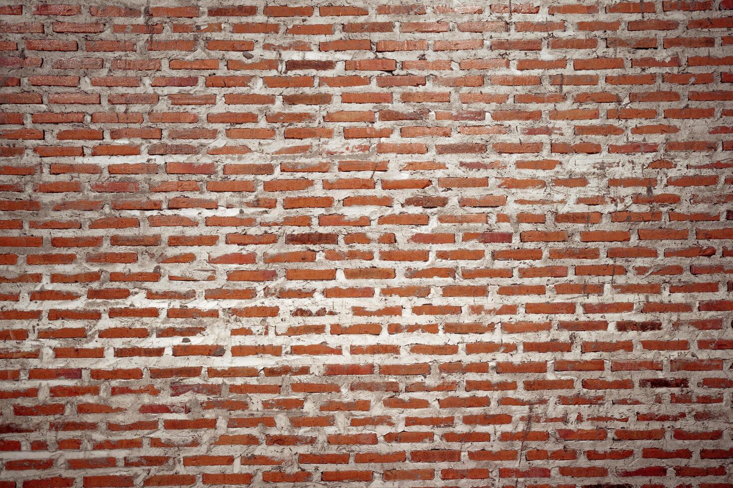 old brown brick wall background. Wallpaper wall, sandstone wall for wallpaper, Old grunge brick wall pattern or texture. photo