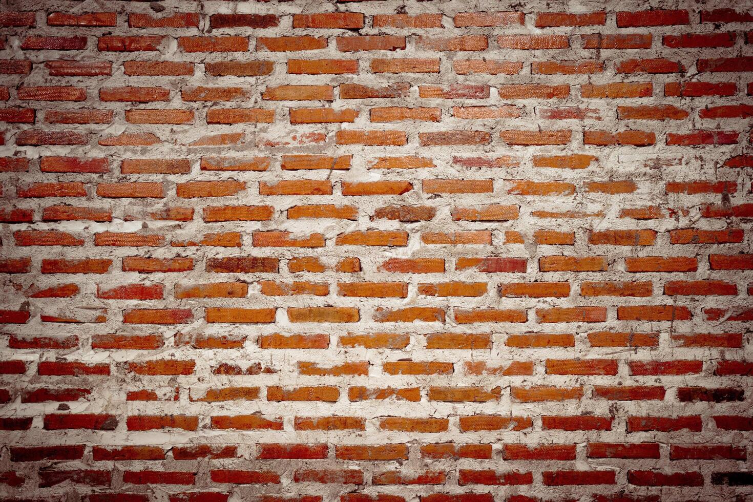 old brown brick wall background. Wallpaper wall, sandstone wall for wallpaper, Old grunge brick wall pattern or texture. photo