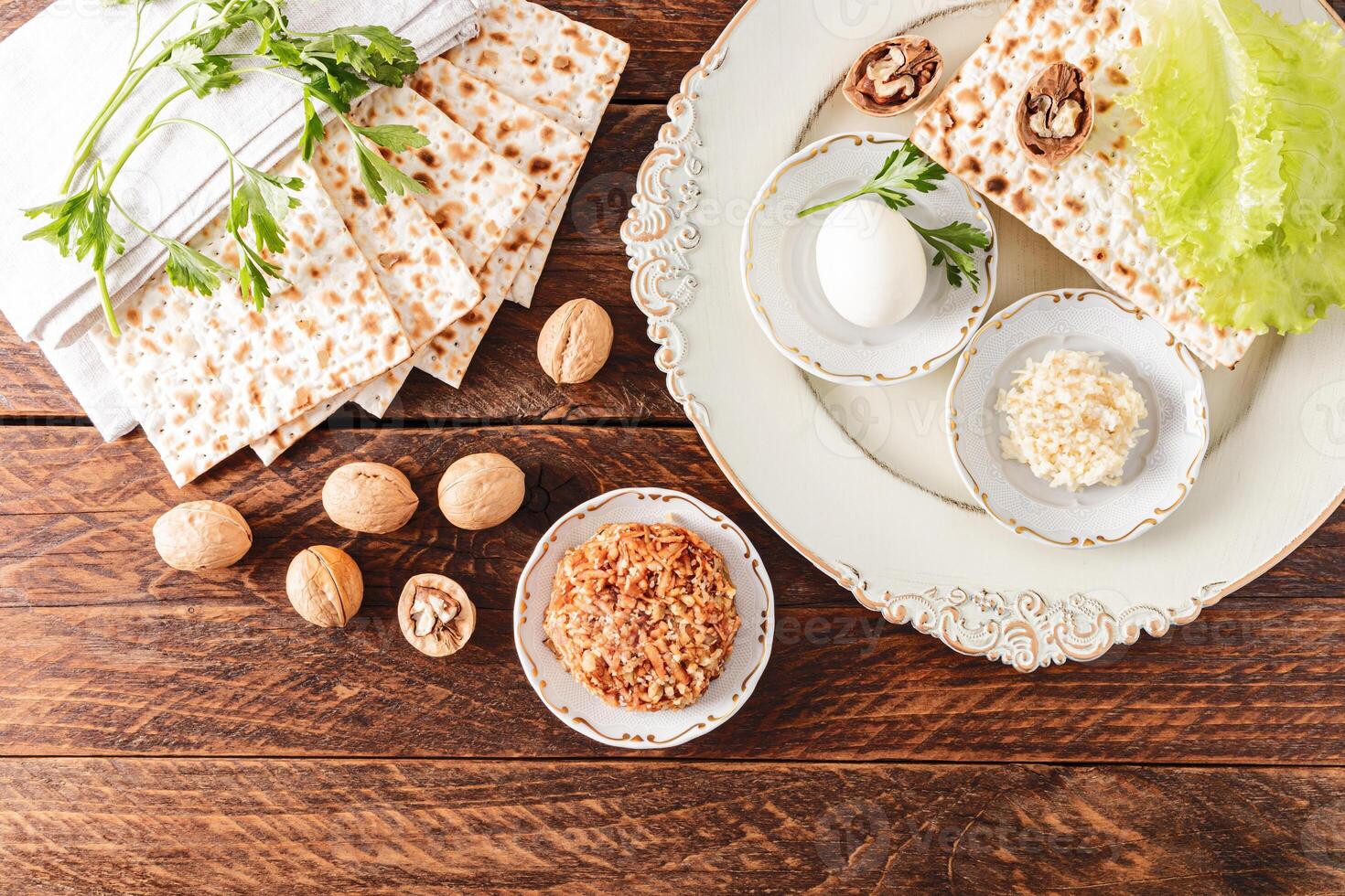 Festive background for Jewish Passover holiday with traditional food and symbols. The concept of the Passover holiday. Top view. photo