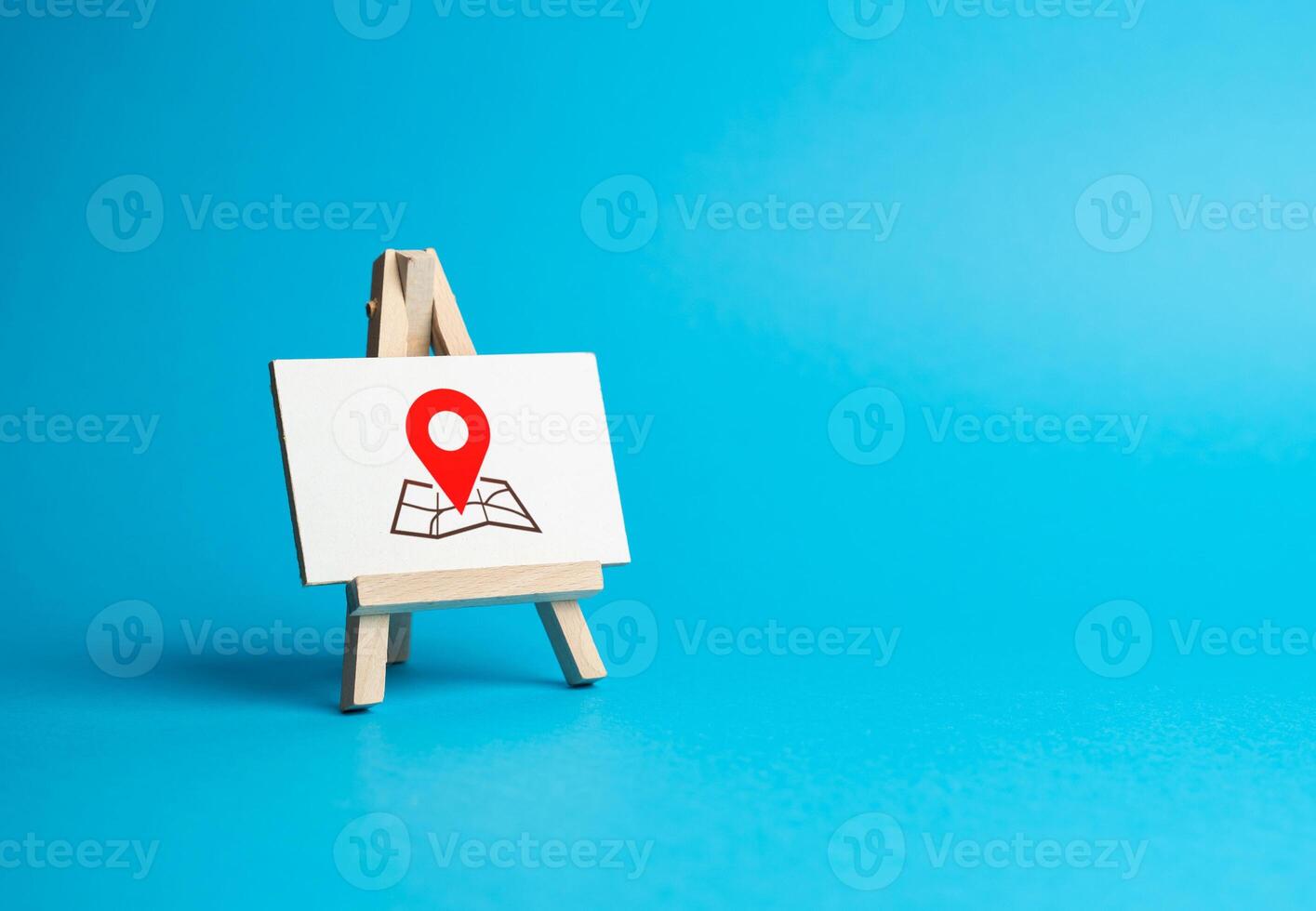 Easel stand sign and geo location. Advertising and awareness. Tracking and navigation planning. Leisure and tourism, entertainment. Search for new places to travel. Guide on interesting destinations. photo