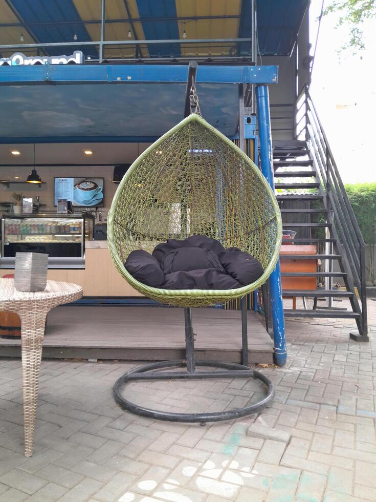 Photo of a hanging lounge chair. Perfect for magazines, newspapers, adverts and tabloids