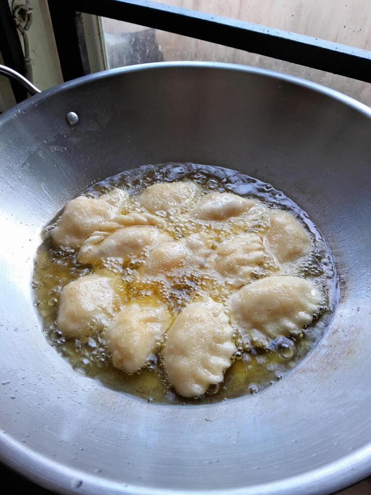 A photo of a cake being fried. Perfect for magazines, newspapers and tabloids