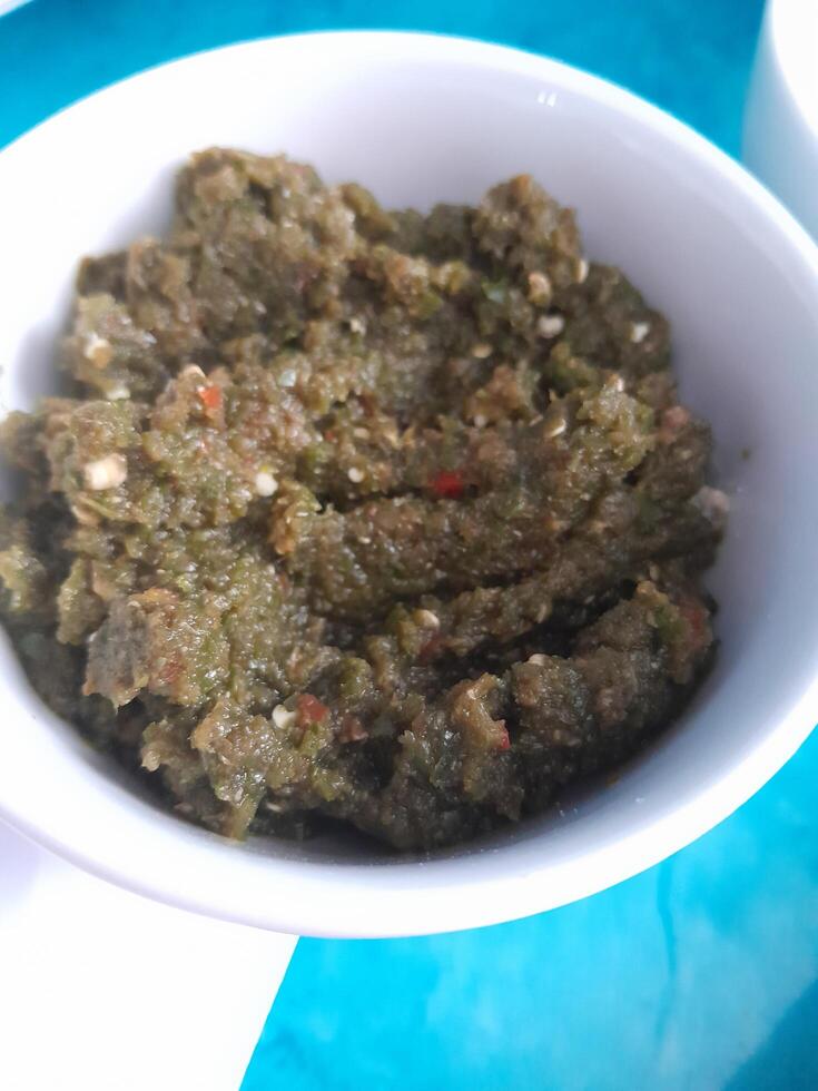 Grounded Chilies Spices in a bowl. This photo is perfect for food magazines, tabloid newspapers, food recipe books