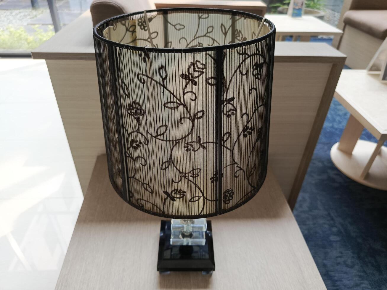 Photo of decorative lamp on the table. Perfect for magazines, newspapers and tabloids