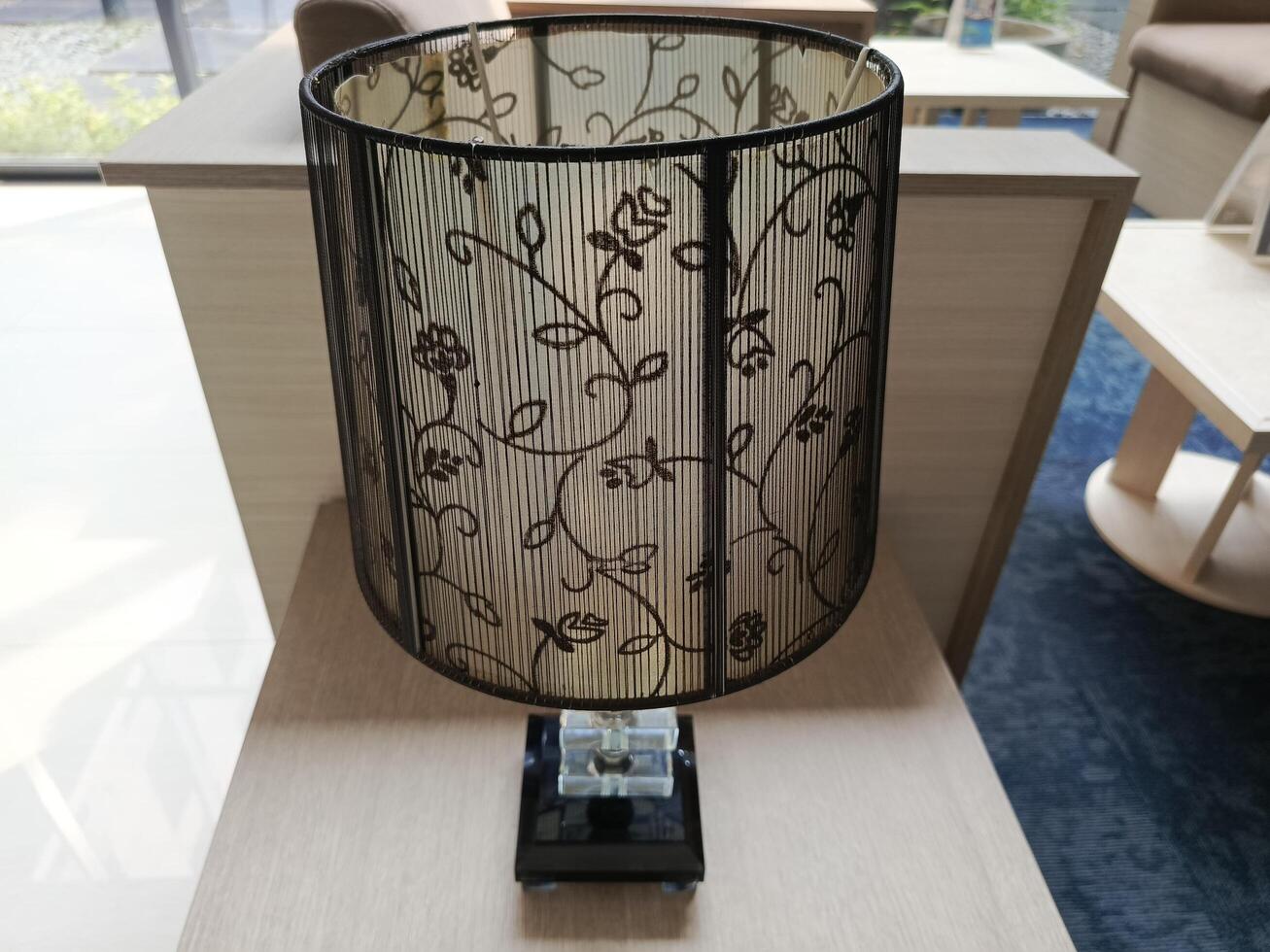 Photo of decorative lamp on the table. Perfect for magazines, newspapers and tabloids