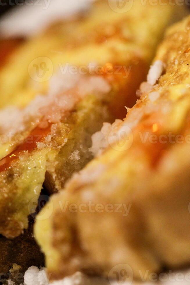 a close up of a piece of french toast photo