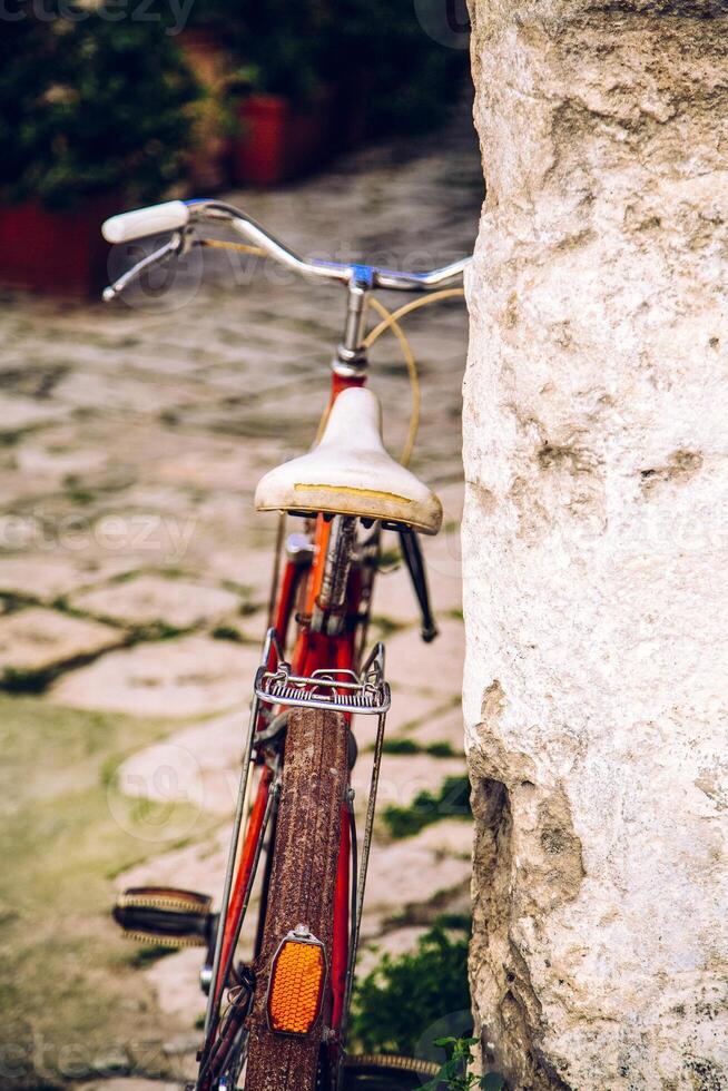 Vintage bicycle on the street photo