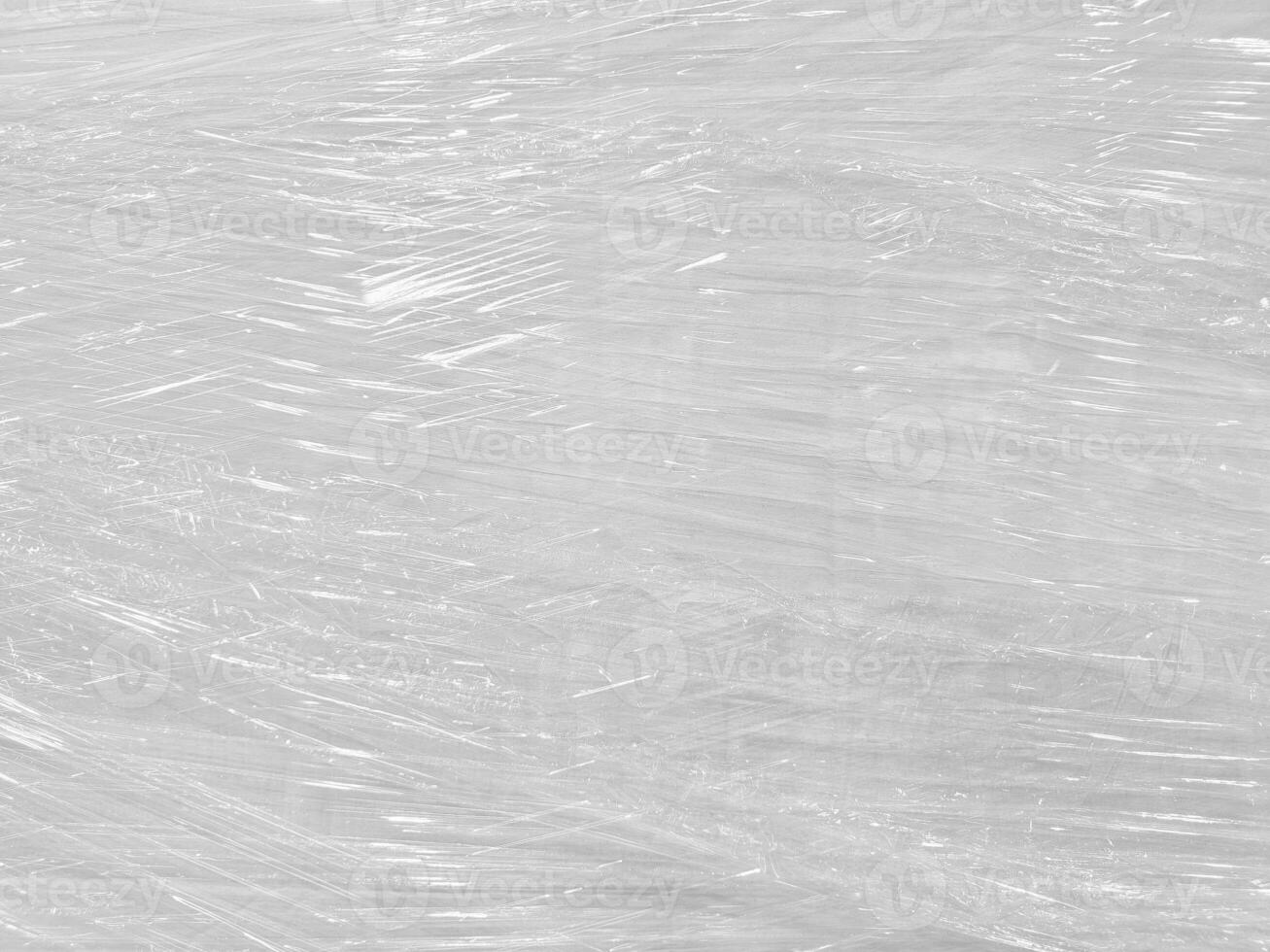 White Plastic Wrap on Cardboard Box Background photo