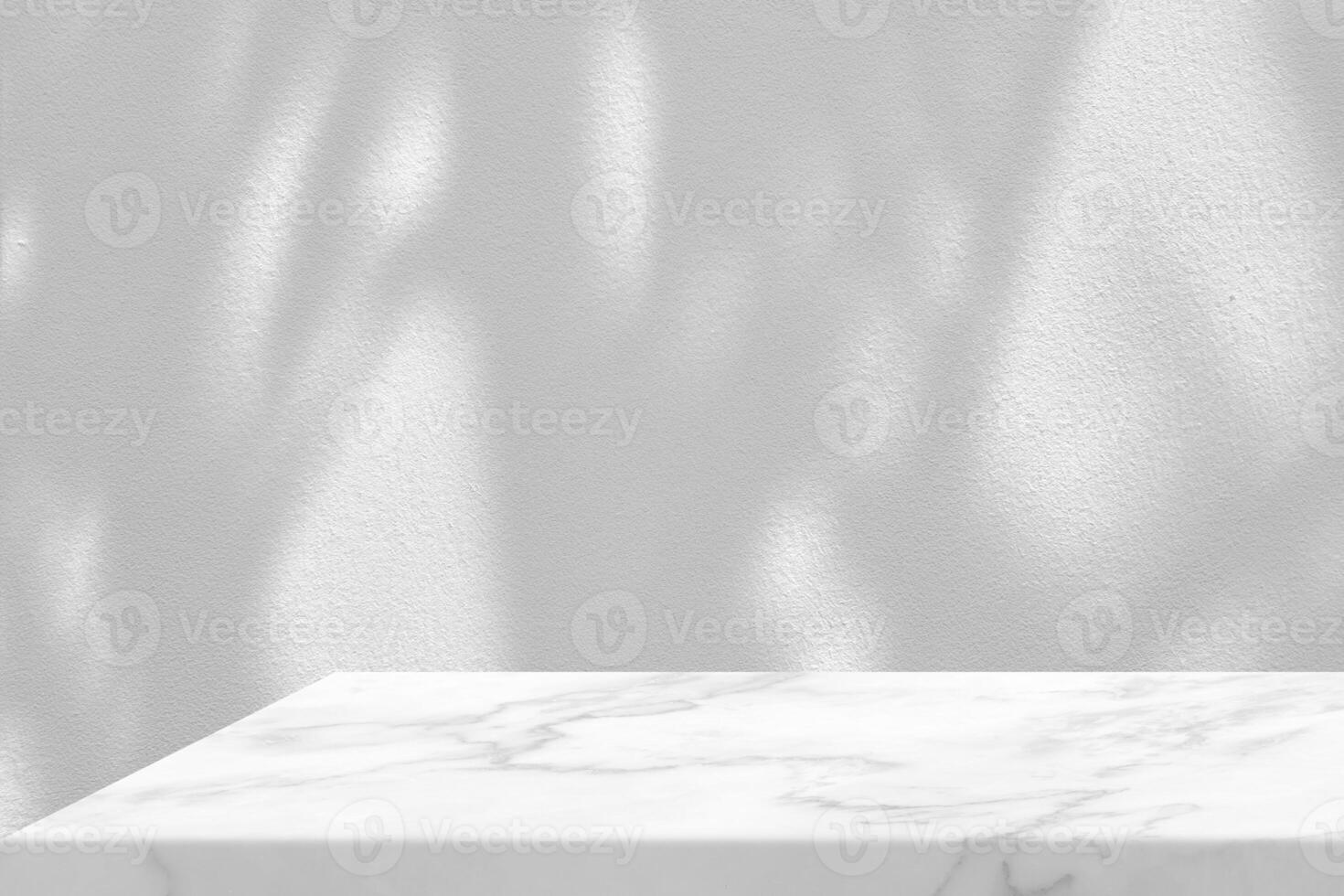 Minimal White Marble Table Corner with Tree Shadow on Concrete Wall Background, Suitable for Product Presentation Backdrop, Display, and Mock up. photo