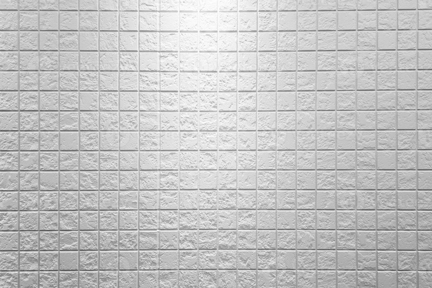 Tiles Wall Texture Background with Spotlight from the Top. photo