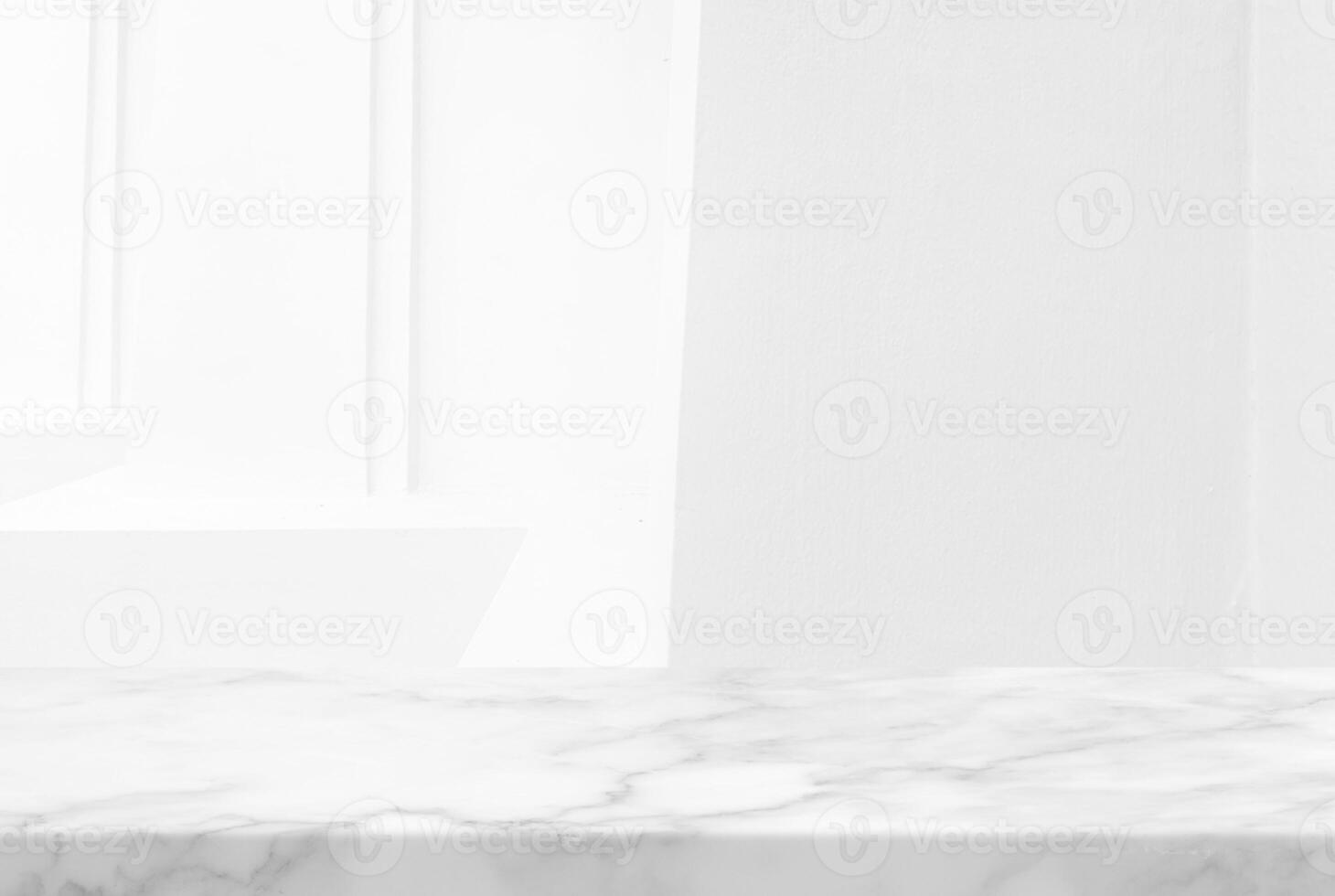 Minimal White Marble Table Corner with Illuminated Concrete Wall Background, Suitable for Product Presentation Backdrop, Display, and Mock up. photo