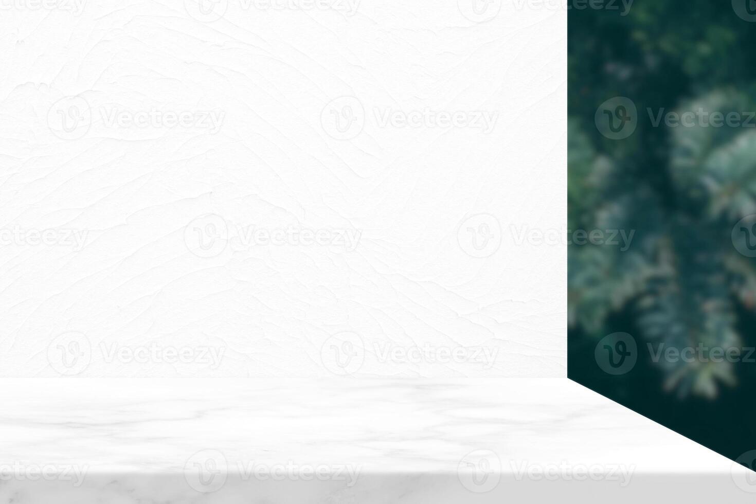 White Marble Table with Concrete Wall and Blurred Pine Leaves Background, Suitable for Product Presentation Backdrop, Display, and Mock up. photo