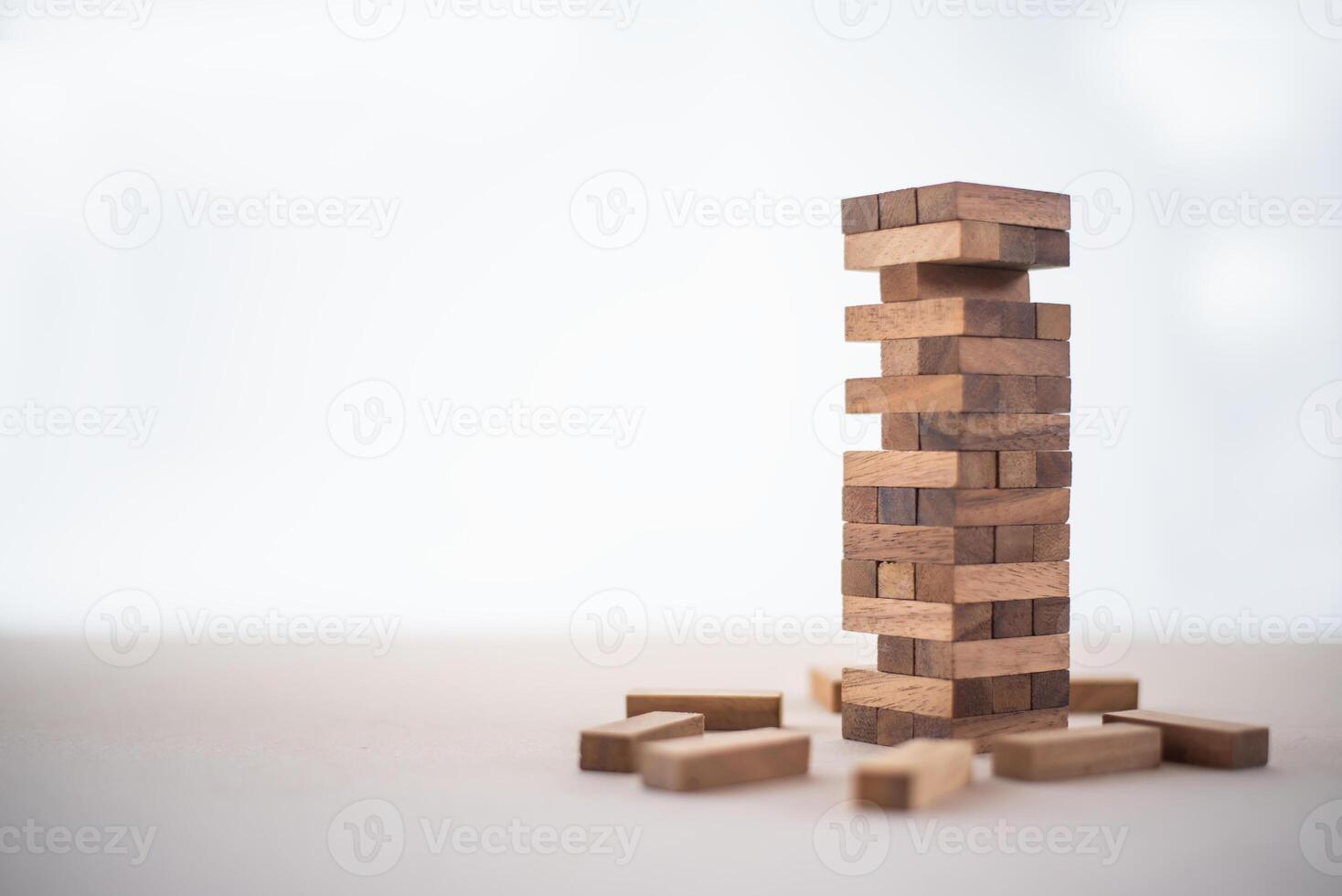 Business risks in the business. Requires planning Meditation must be careful in deciding to reduce the risk in the business. As the game drew to a wooden block from the tower photo