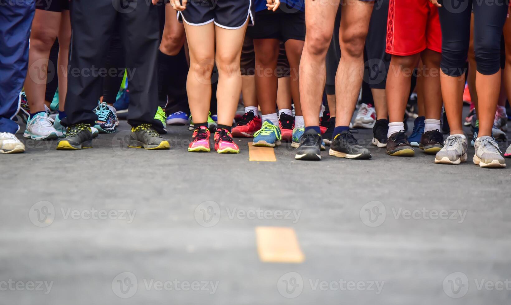 Marathoners are waiting to be released at the starting line. photo