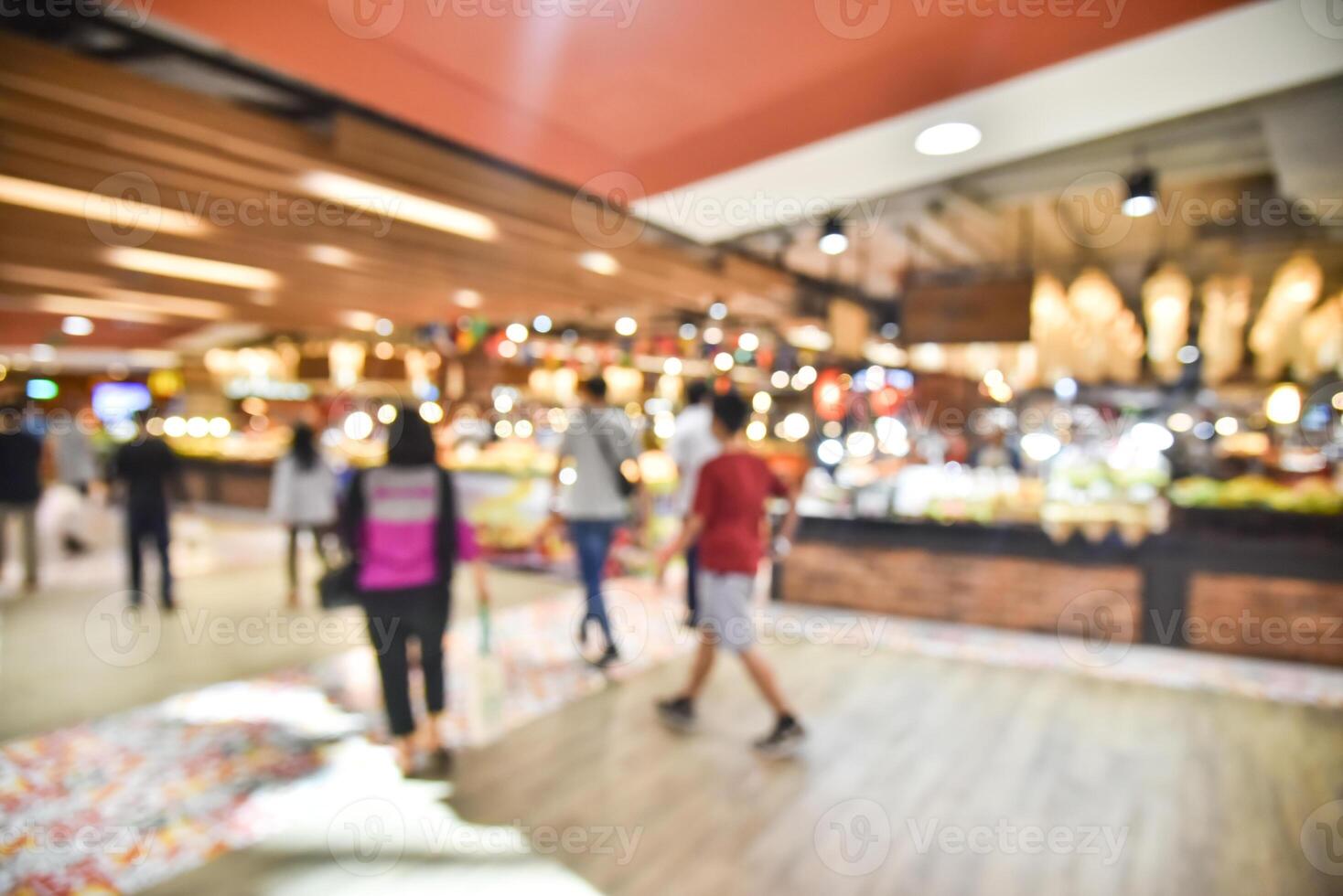 Blurred images, people walking shopping photo