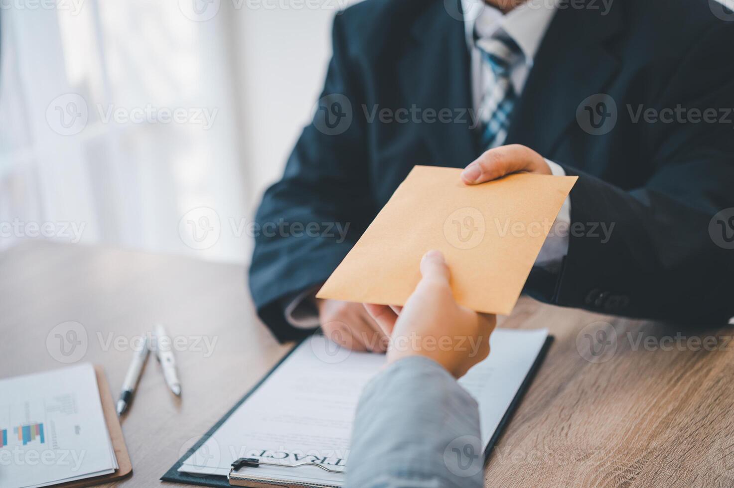 businessman was negotiating a bribery arrangement in which the dollar would be accepted as a bribe. Concepts of anti-bribery and anti-corruption photo