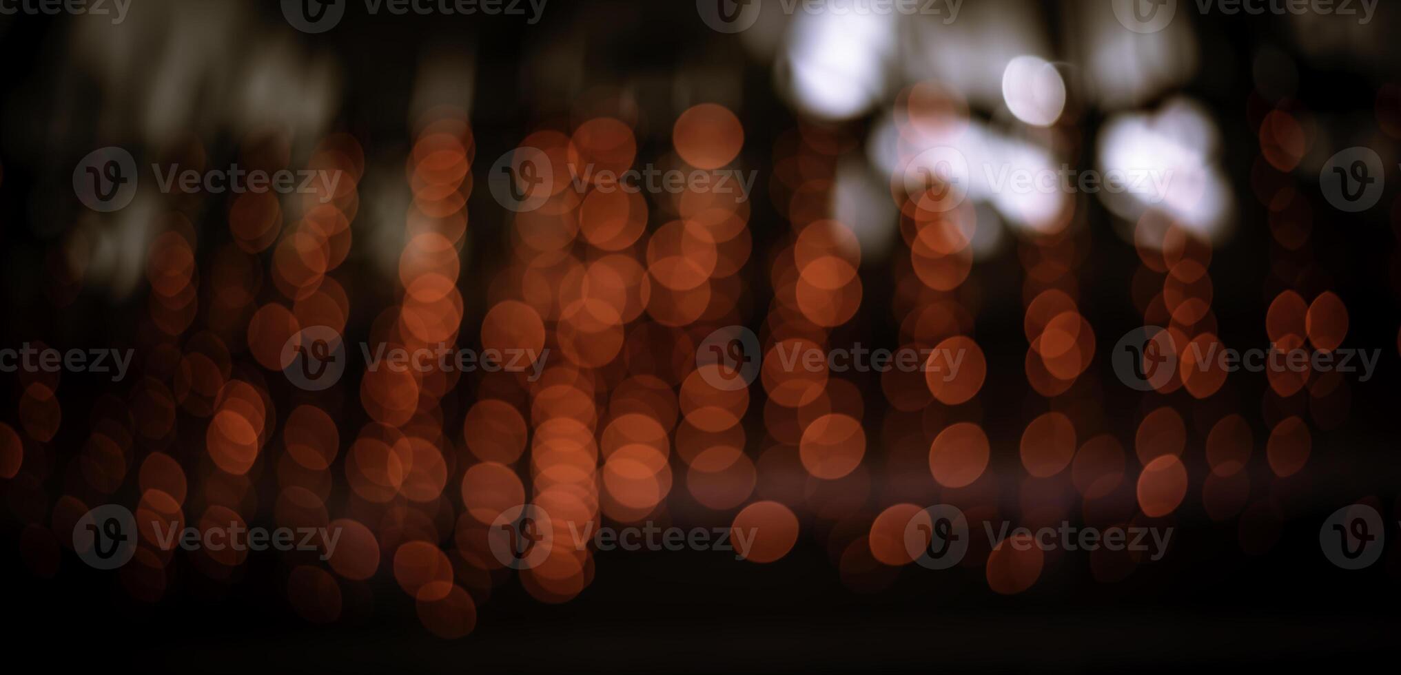 Colorful lights blur the background. Celebration at night. photo