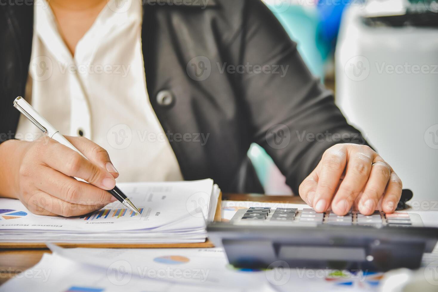 Businessman are working with a calculator and document. Meeting report in progress. in office business concept photo