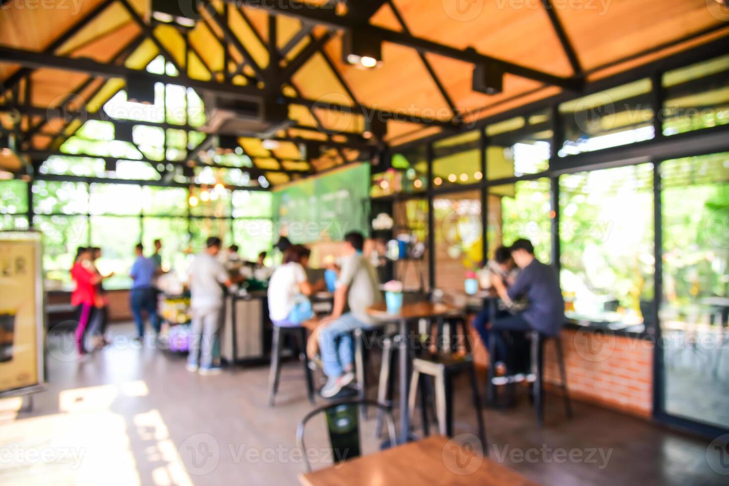 Blur coffee shop where people use the service photo