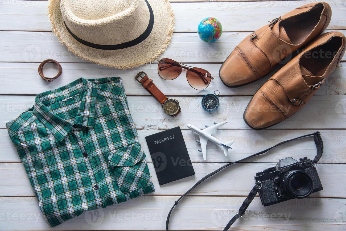 Travel accessories costumes. Passports, luggage, The cost of travel maps prepared for the trip photo