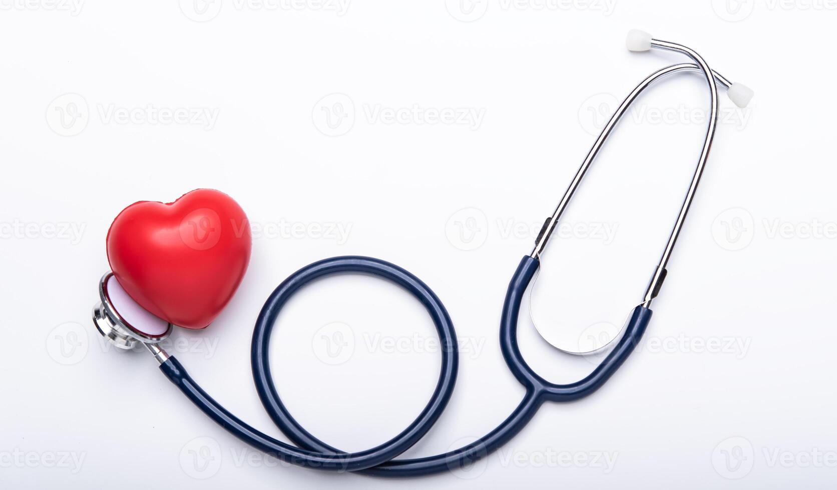 Medical Headphones , stethoscope with red heart on white background photo