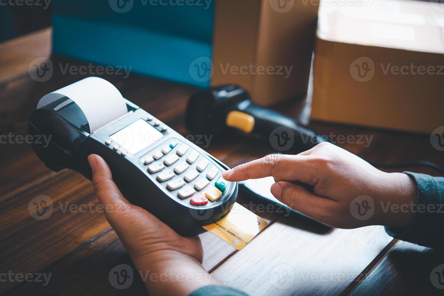 Paying by credit card , buying and selling products using a credit card swipe machine photo
