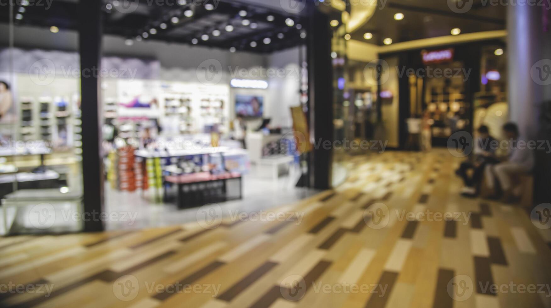 Shopping mall  blurred indoors with light for lifestyle concept photo