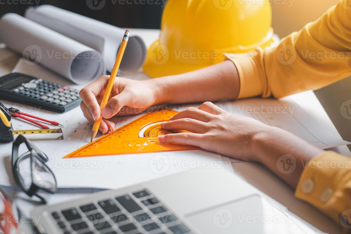engineer working in office with blueprints, inspection in workplace for architectural plan, construction project ,Business construction photo