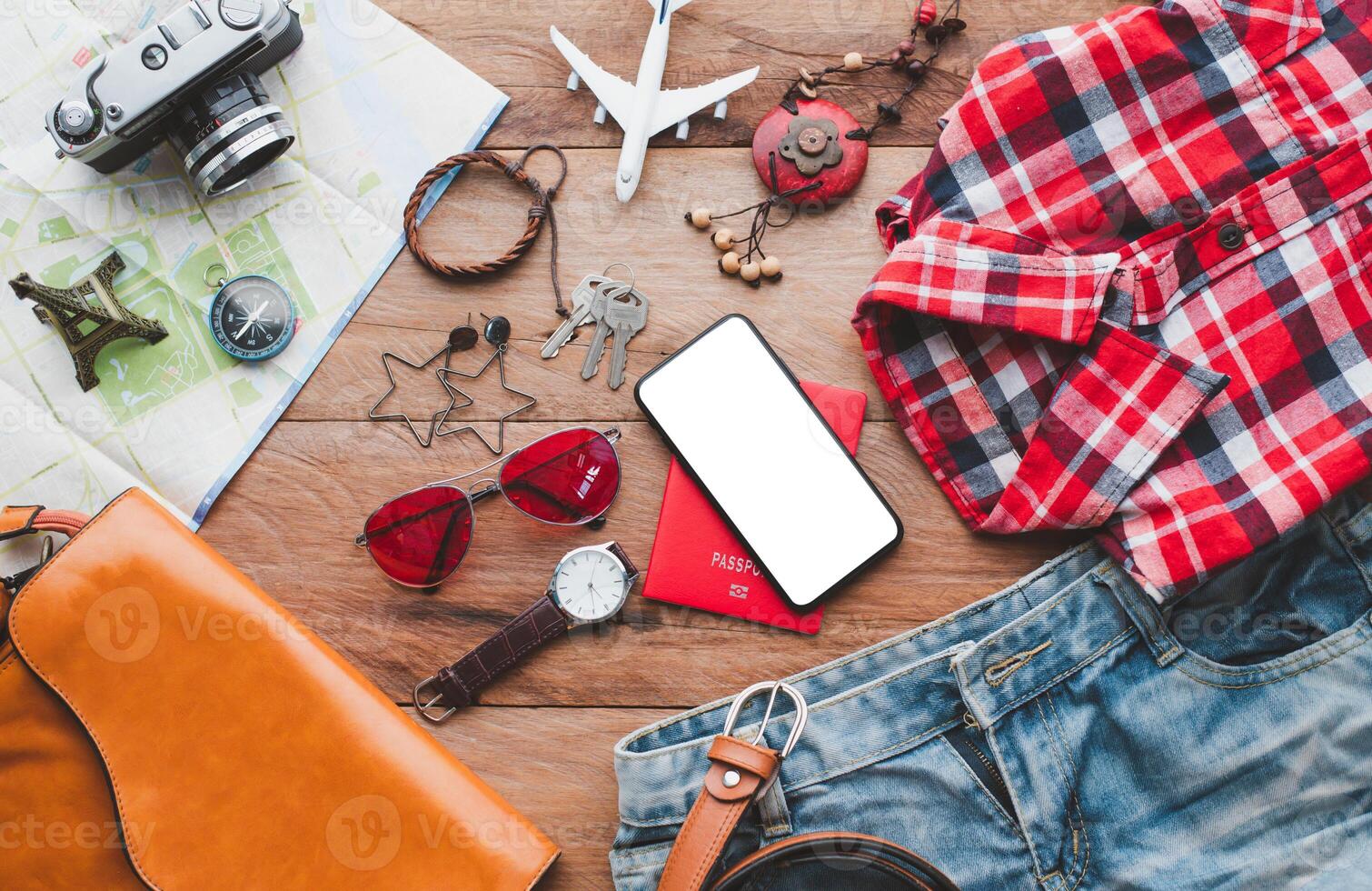 Travel accessories costumes. Passports, luggage, The cost of travel maps prepared for the trip photo