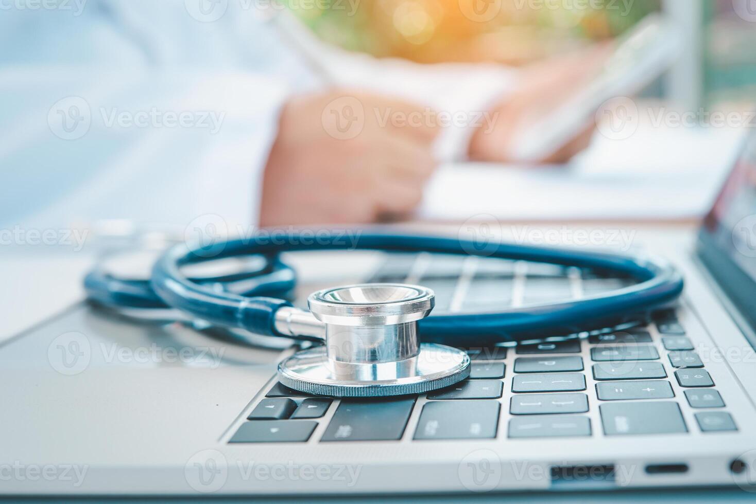 Stethoscope with clipboard on desk,Doctor Recommends Patient, Healthcare and medical concept. photo