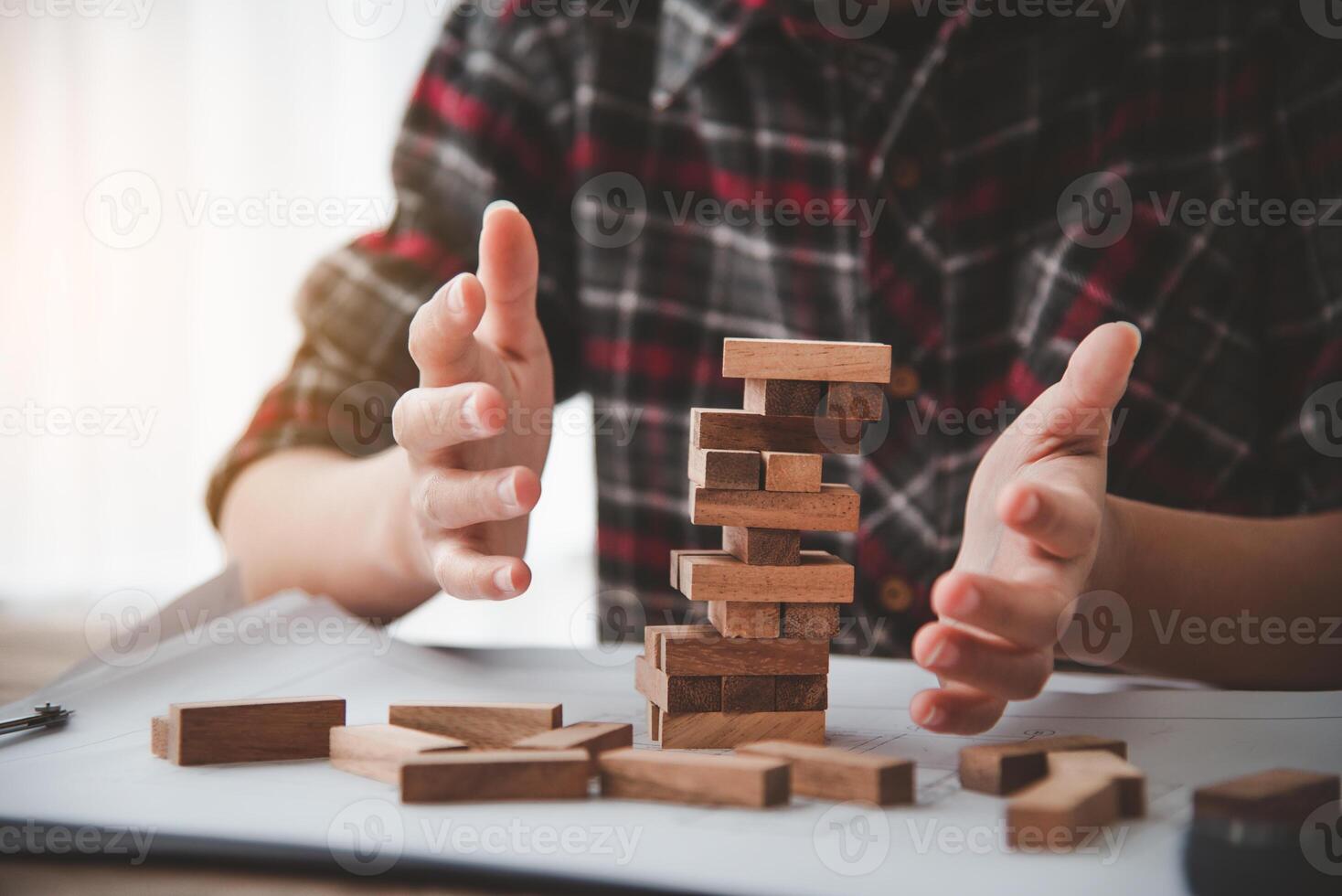 Business risks in the business. Requires planning Meditation must be careful in deciding to reduce the risk in the business. As the game drew to a wooden block from the tower photo