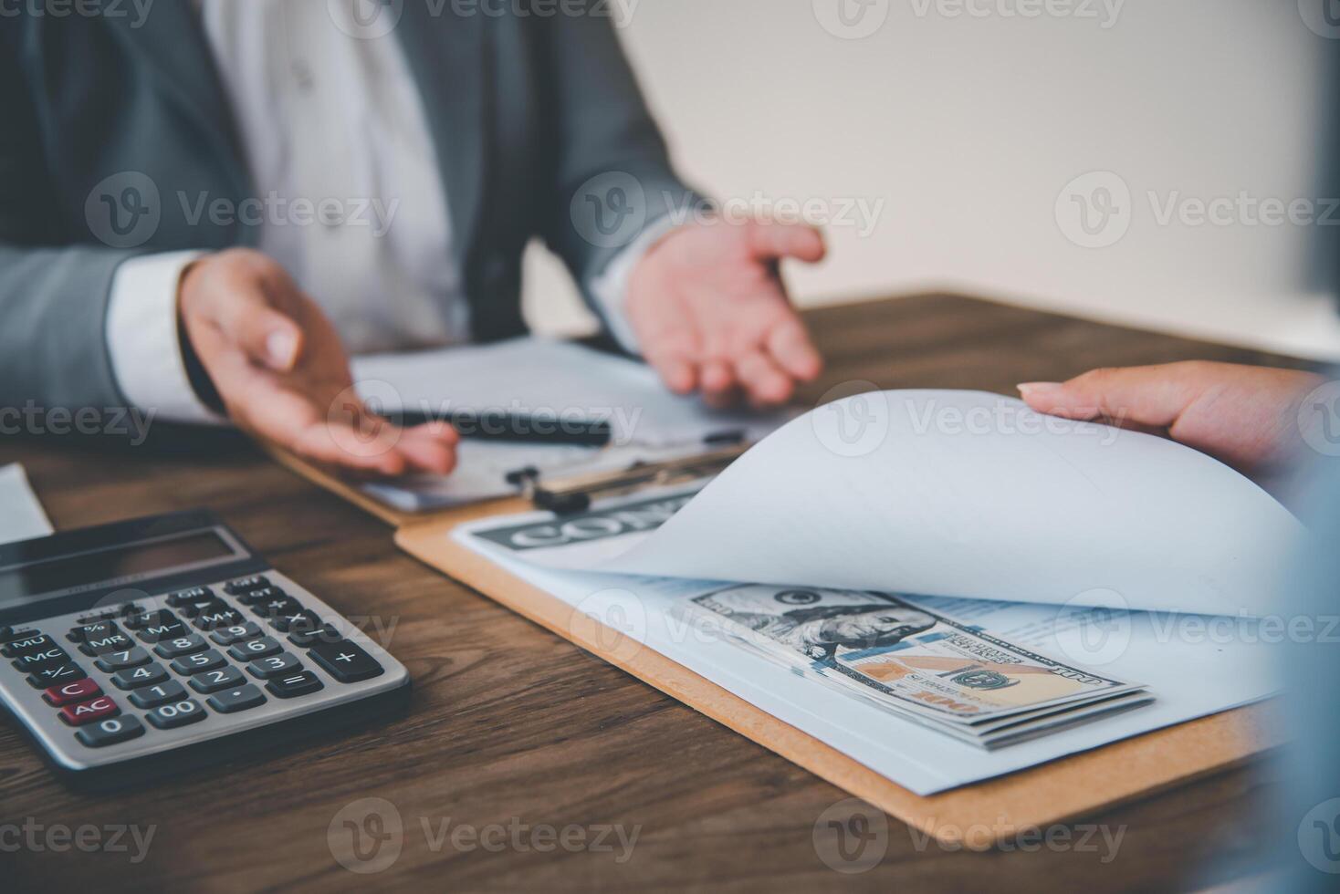 businessman was negotiating an agreement in which the dollar was accepted as a bribe in corruption. anti bribery and corruption concepts photo