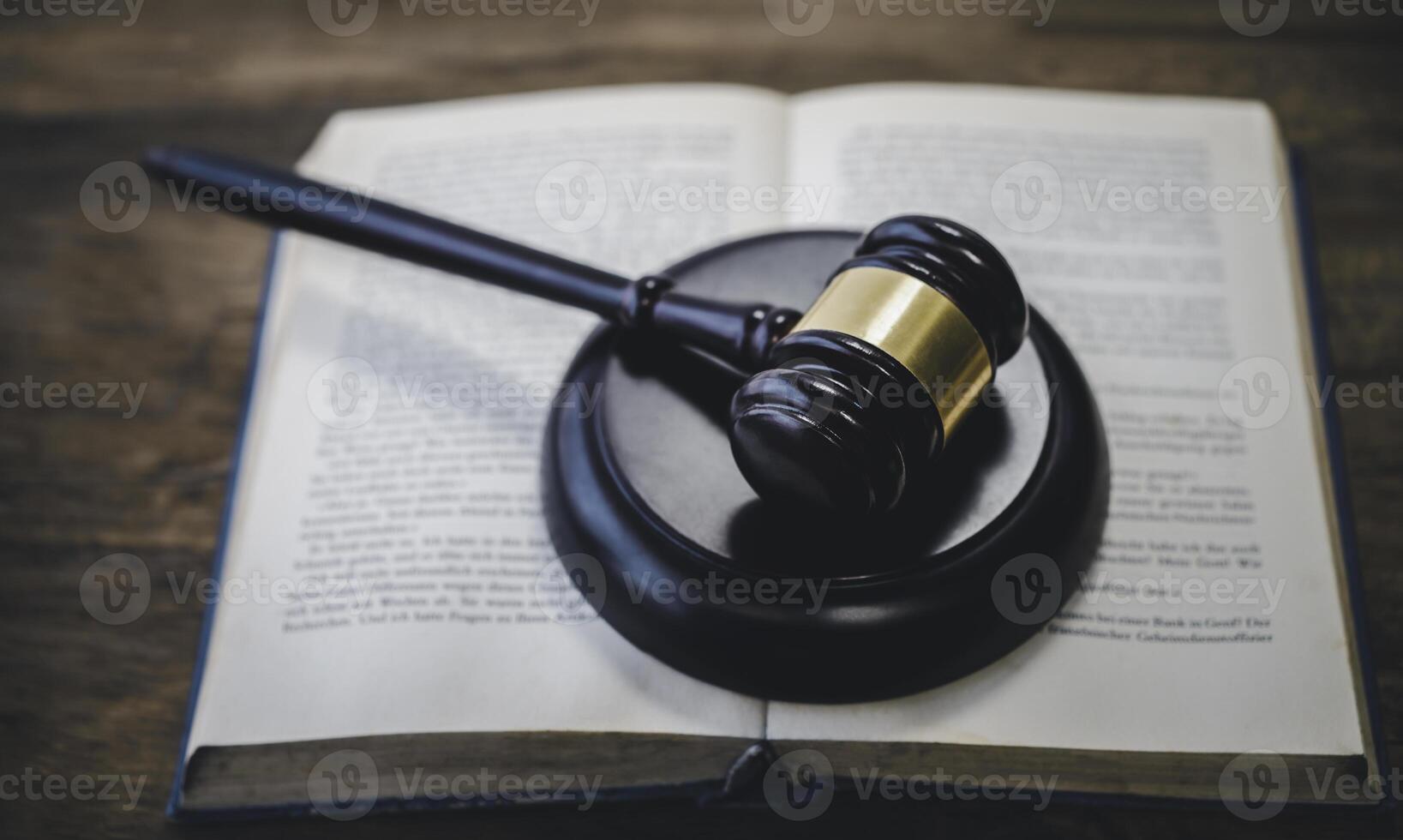 Law theme, mallet of the judge, law enforcement officers, evidence-based cases and documents taken into account.. photo