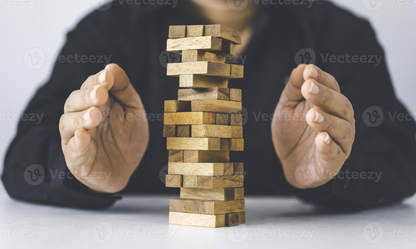 Business risks in the business. Requires planning Meditation must be careful in deciding to reduce the risk in the business. As the game drew to a wooden block from the tower photo