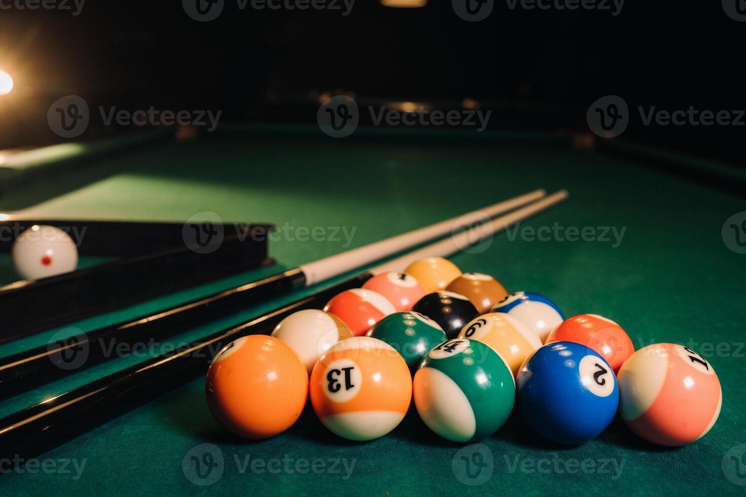 Billiard table with green surface and balls in the billiard club.Pool Game photo