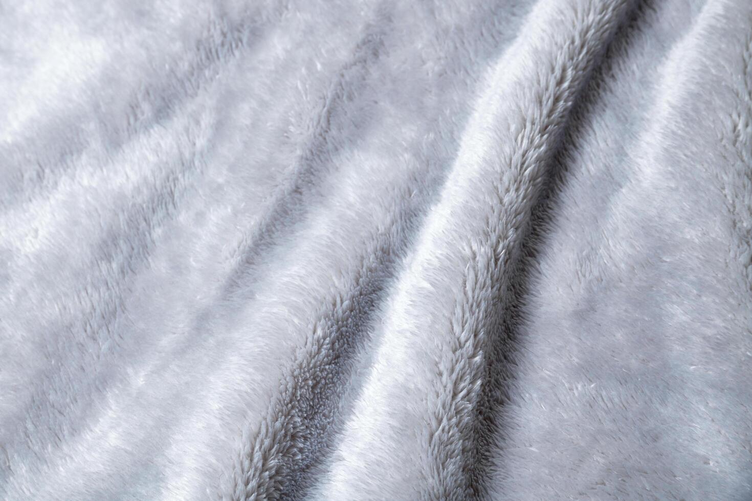 Macro photography of grey blanket photo