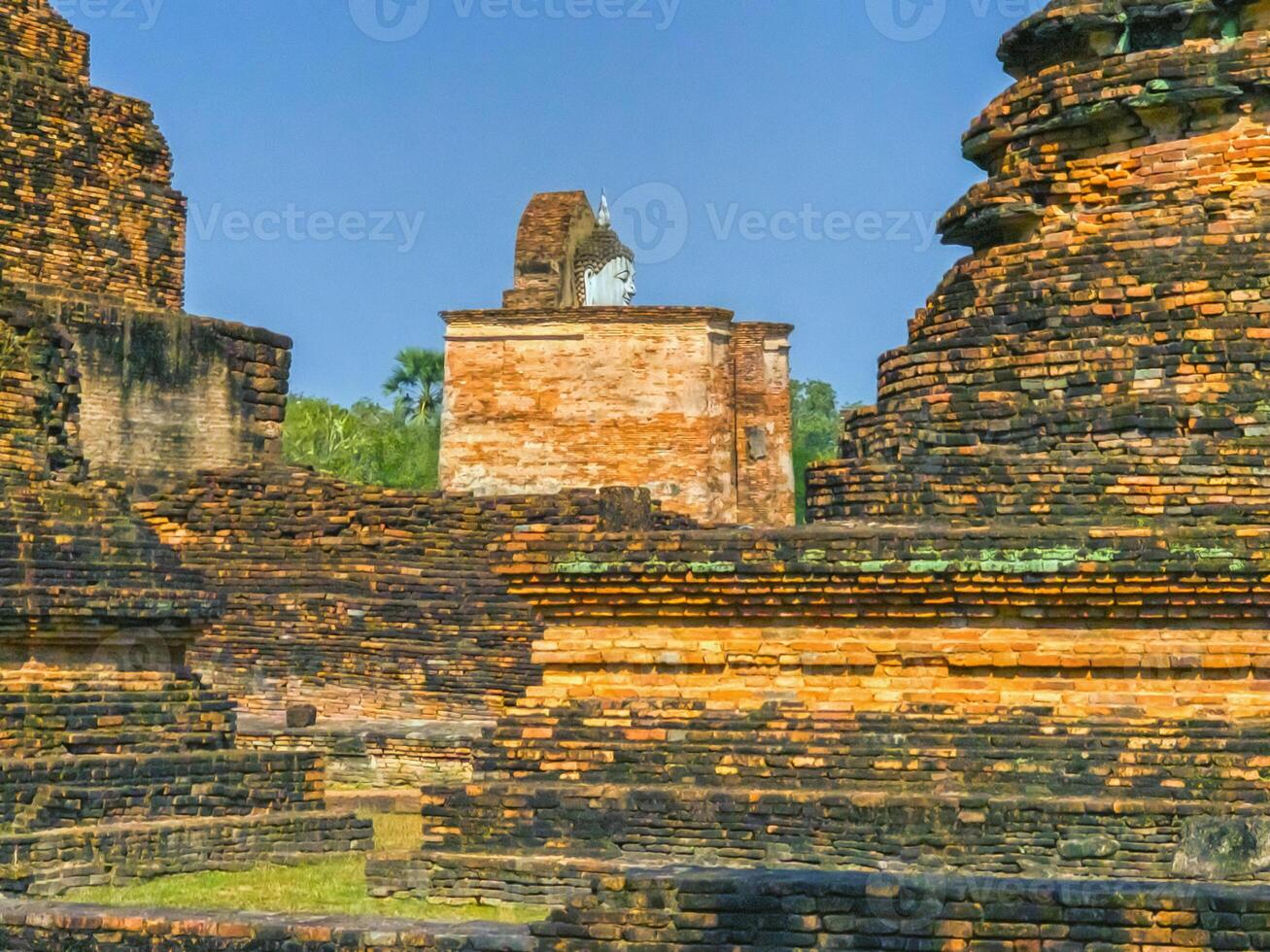 Wat Mahathat temple in Sukhothai historical park, UNESCO World Heritage Site, Thailand photo
